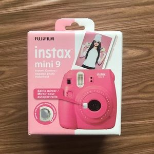 Pink Fujifilm instax mini 9 camera